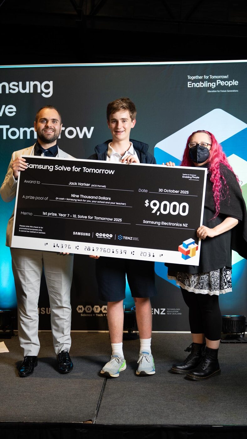 Jack Harker accepting the Samsung Solve for Tomorrow 1st prize cheque for NZ$9,000